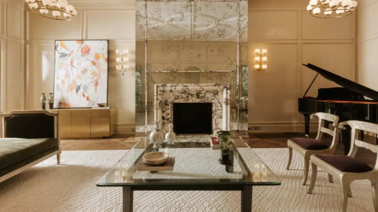 The formal living room fireplace was carved from a marble slab.