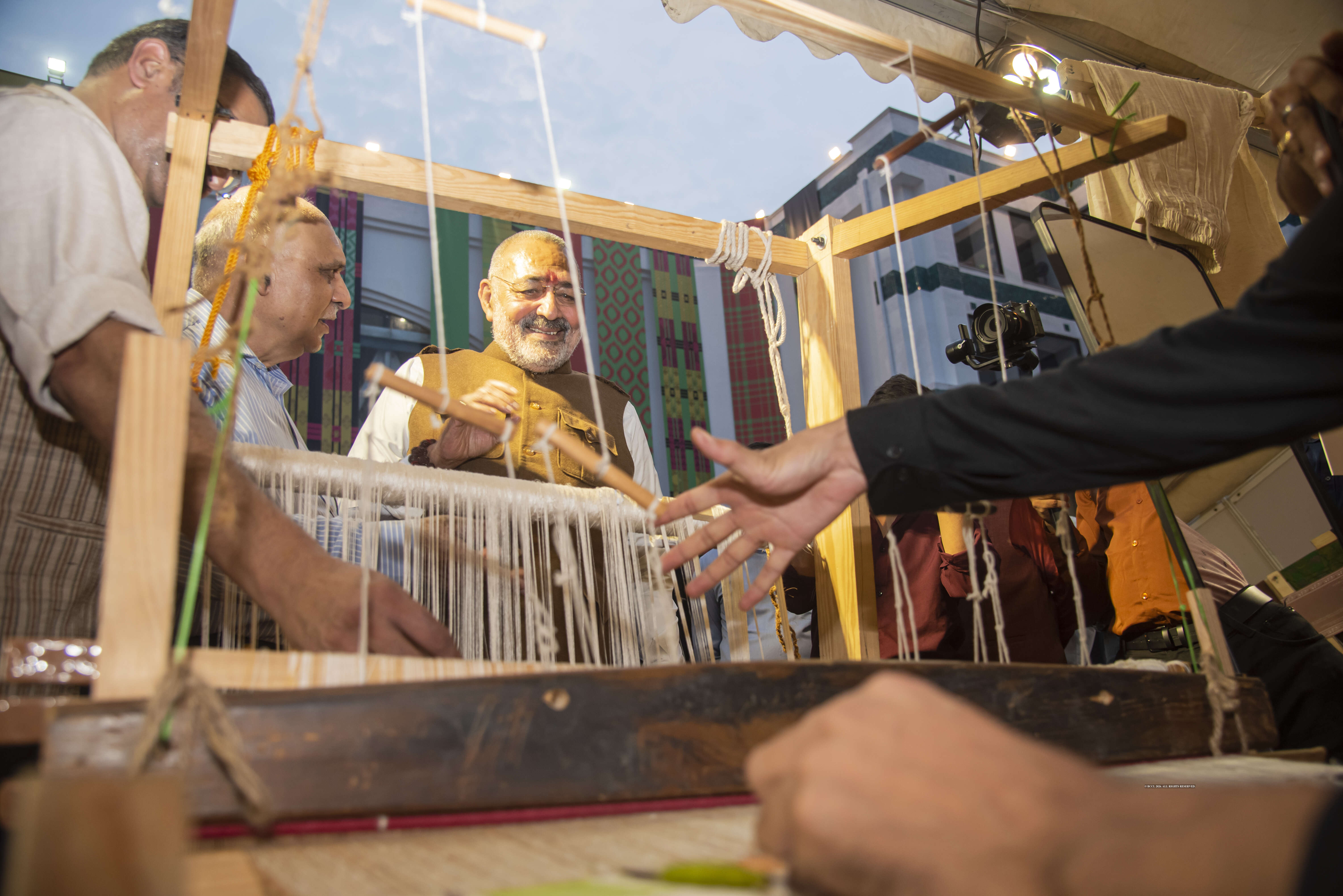 Union Minister of Textiles Giriraj Singh interacts with a kani shawl weaver