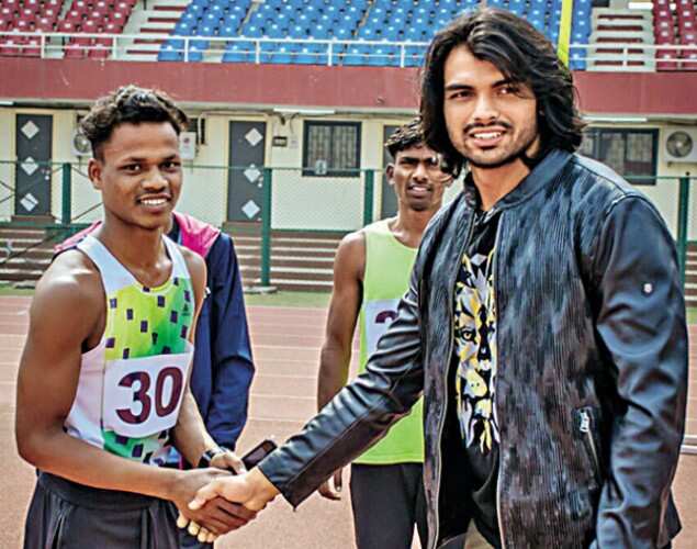 Neeraj Chopra with Narasingh Majhi on the sidelines of his training sessing at Kalinga Stadium in Bhubaneswar