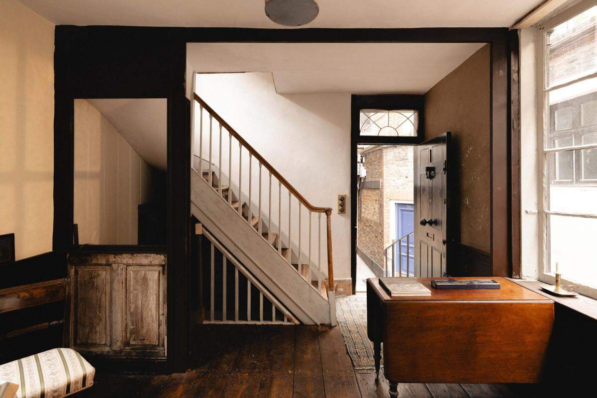The historic London property retains original Georgian features, including an intricate bow window dating back to the early 18th century.