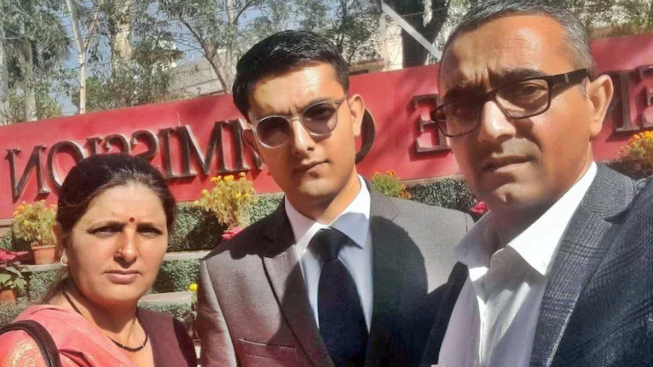 Vikas with his parents.