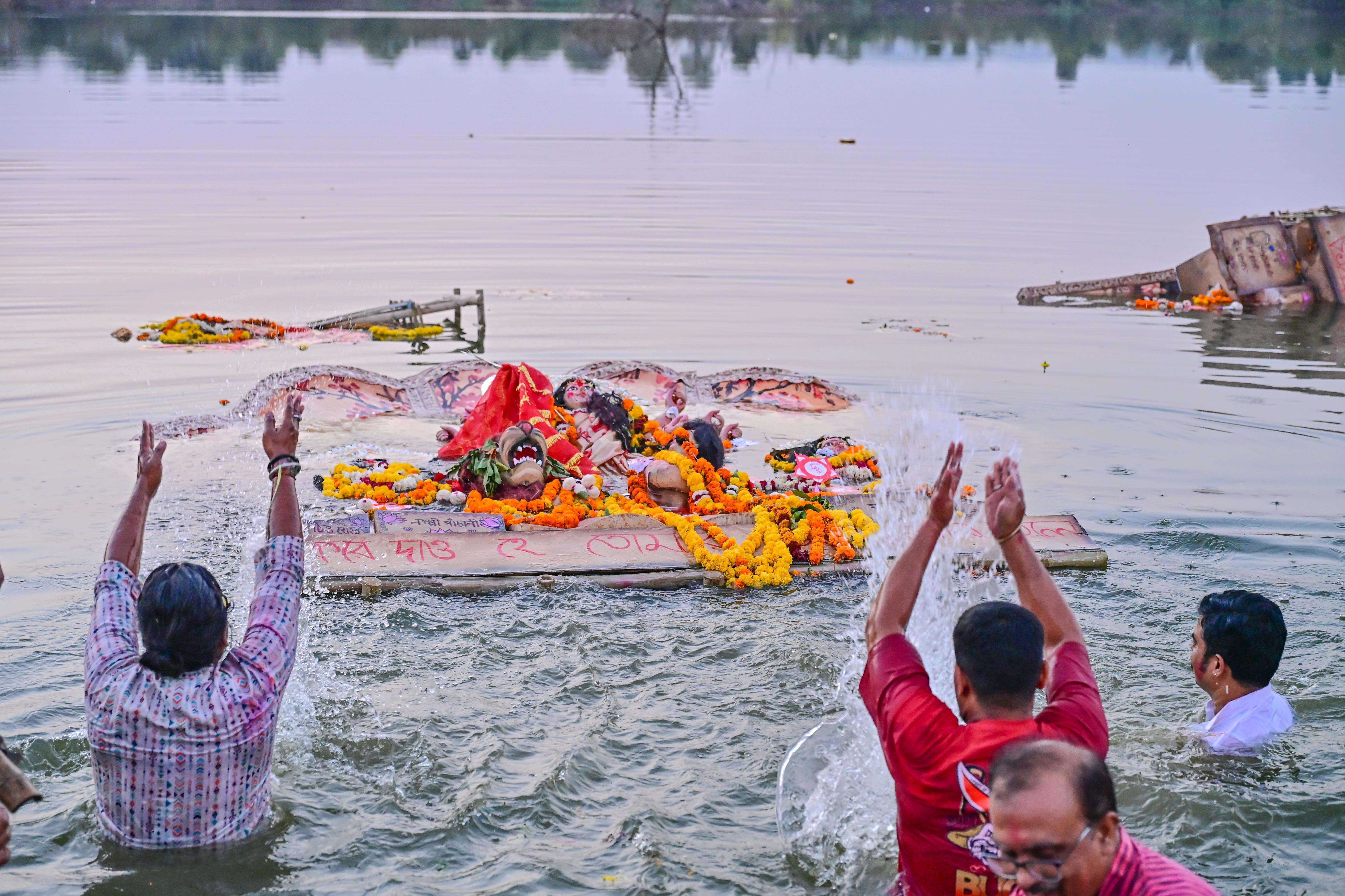 Durga idol immersion at Aakheda dam (10).JPG
