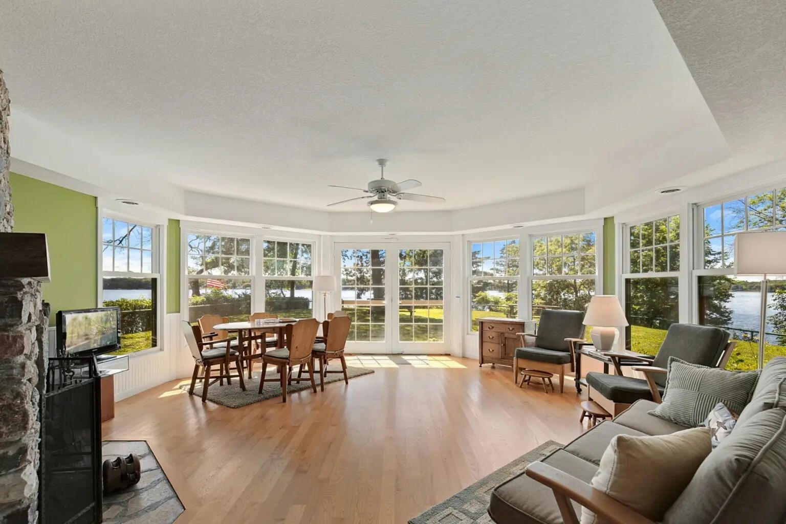 The private island offers 1,841 feet of lakeshore and multiple residential structures.
