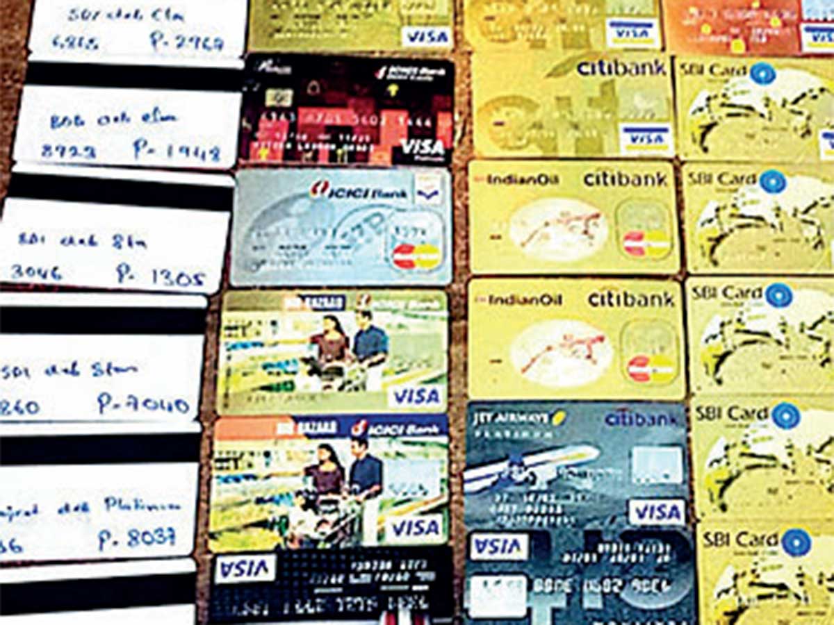 Men with 45 fake ATMs, cards held