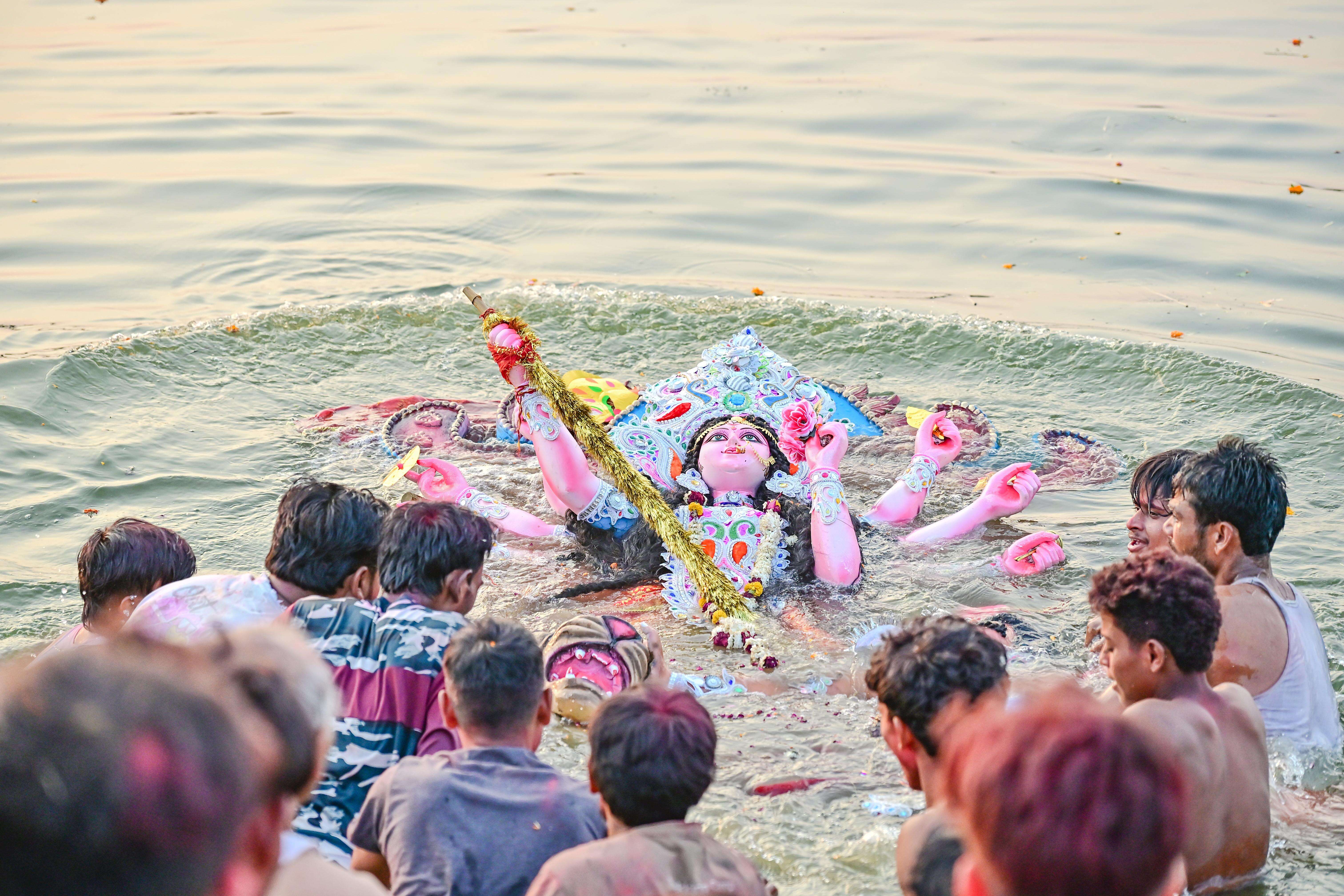 Durga idol immersion at Aakheda dam (7).JPG