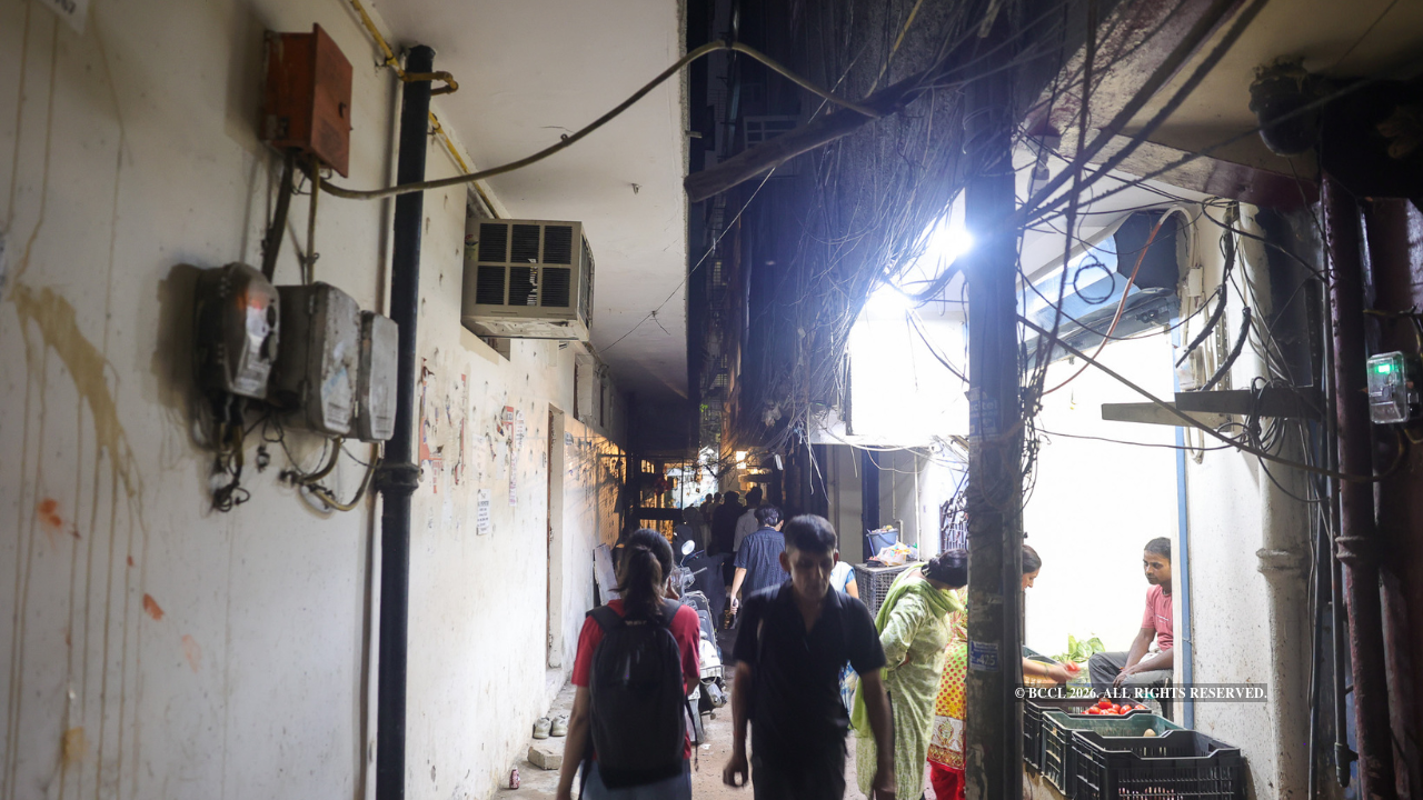 Narrow streets show the congested buildings and wire clusters in the residential area inhabited by students