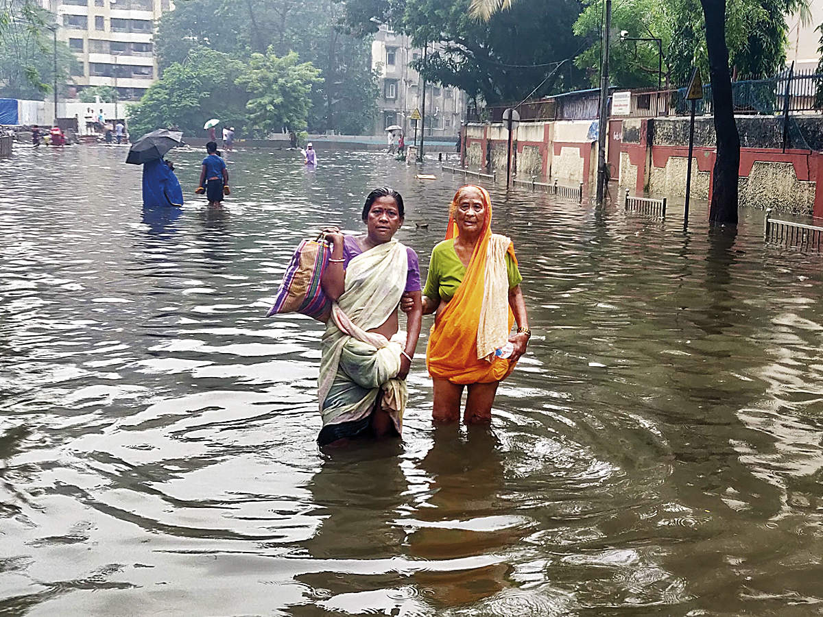 Wading through streets of Mumbai, a nearly-blind woman and her daughter caught in maelstrom