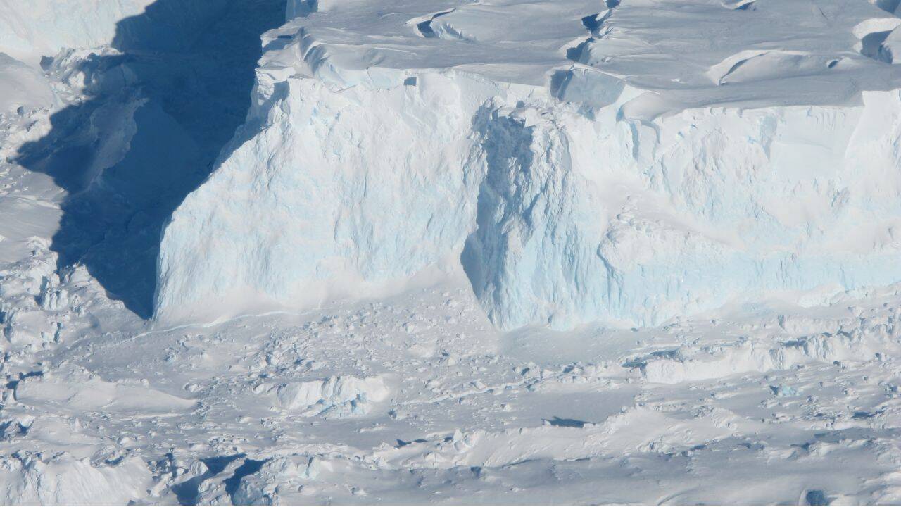 How did meltwater make the Antarctic glacier move 20% faster