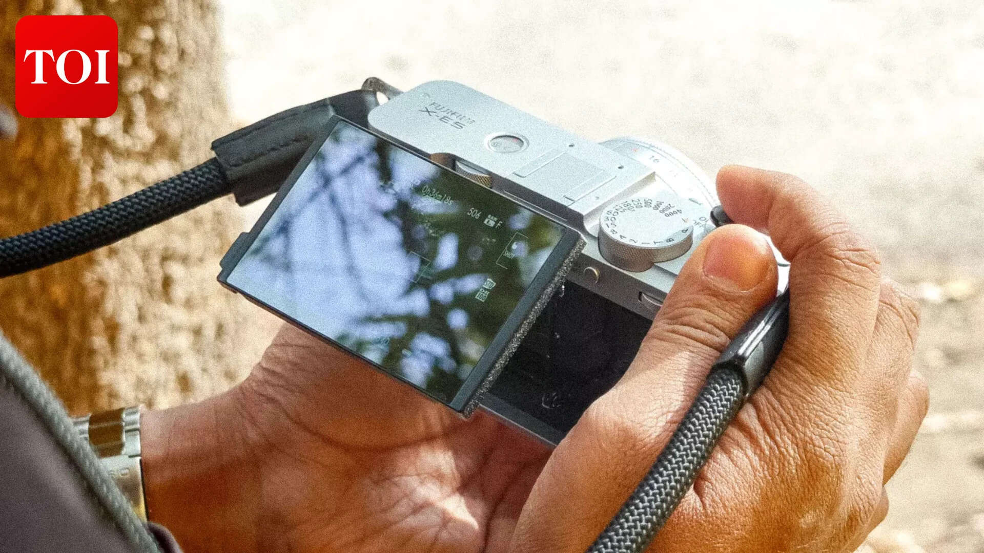 The flip-forward screen is genuinely useful—until you put something in the hot shoe.