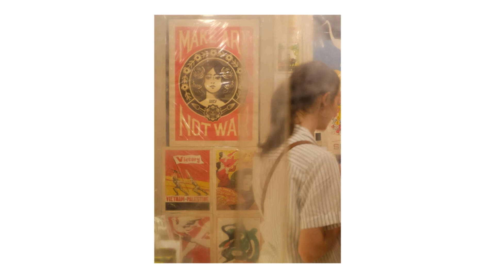 1/40s handheld, her movement blurred, the background held—that's the IBIS working