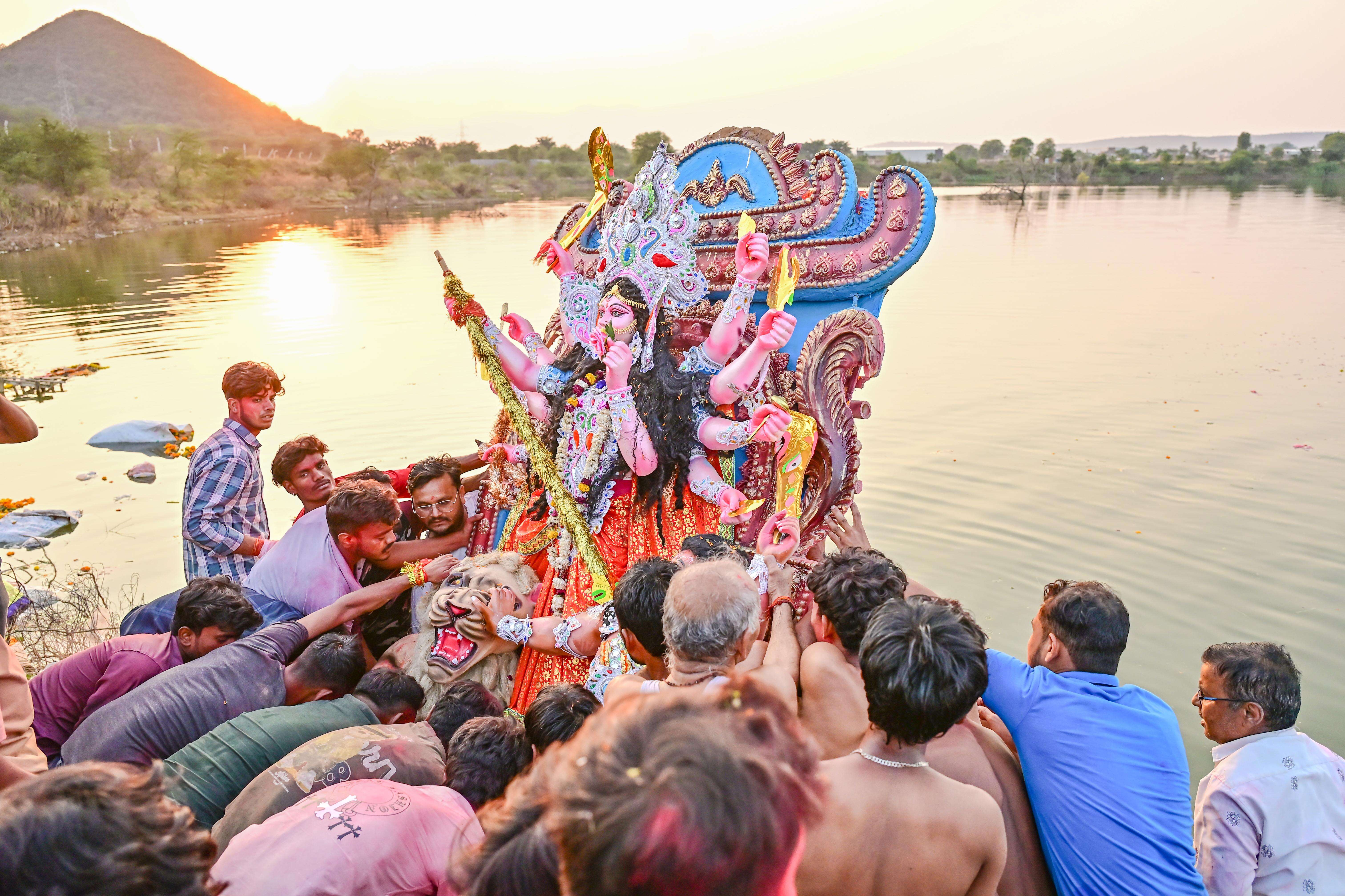 Durga idol immersion at Aakheda dam (5).JPG
