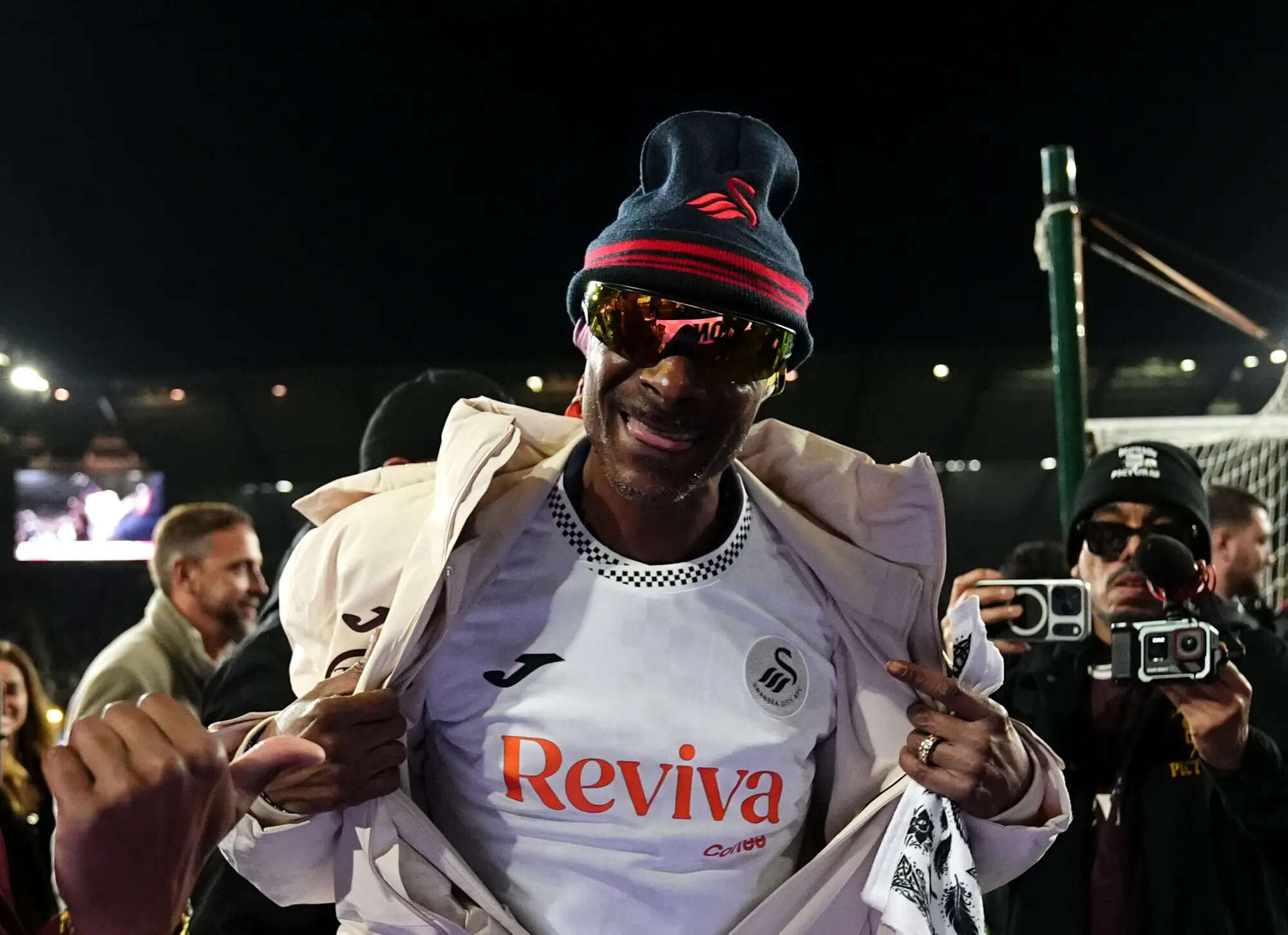 Snoop Dogg's next episode: Rapper attends first Swansea game after Winter Olympics trip
