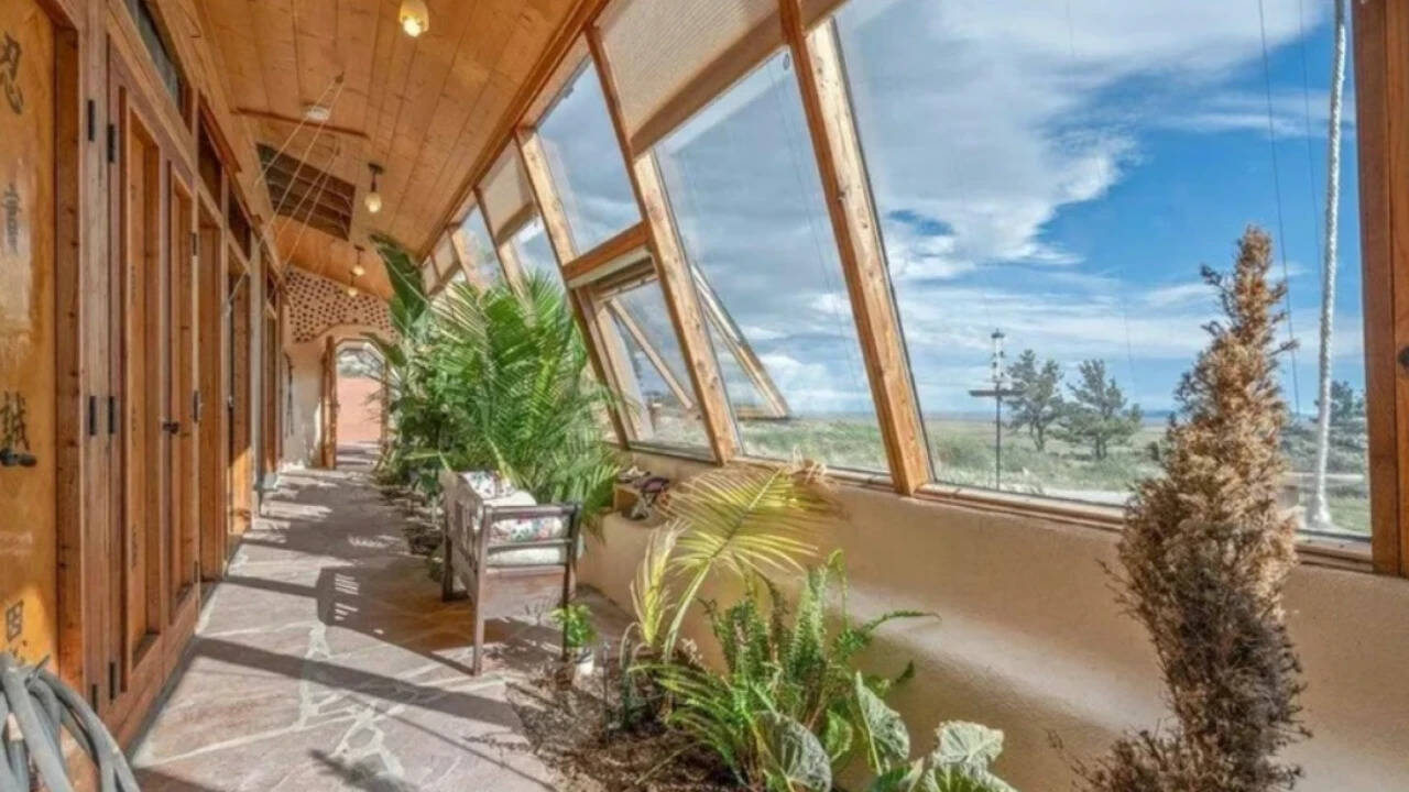Built with 1,343 pounded tyres, the home features plaster walls, bottle-glass work and bottle lighting. Built with 1,343 pounded tyres, the home features plaster walls, bottle-glass work and bottle lighting.