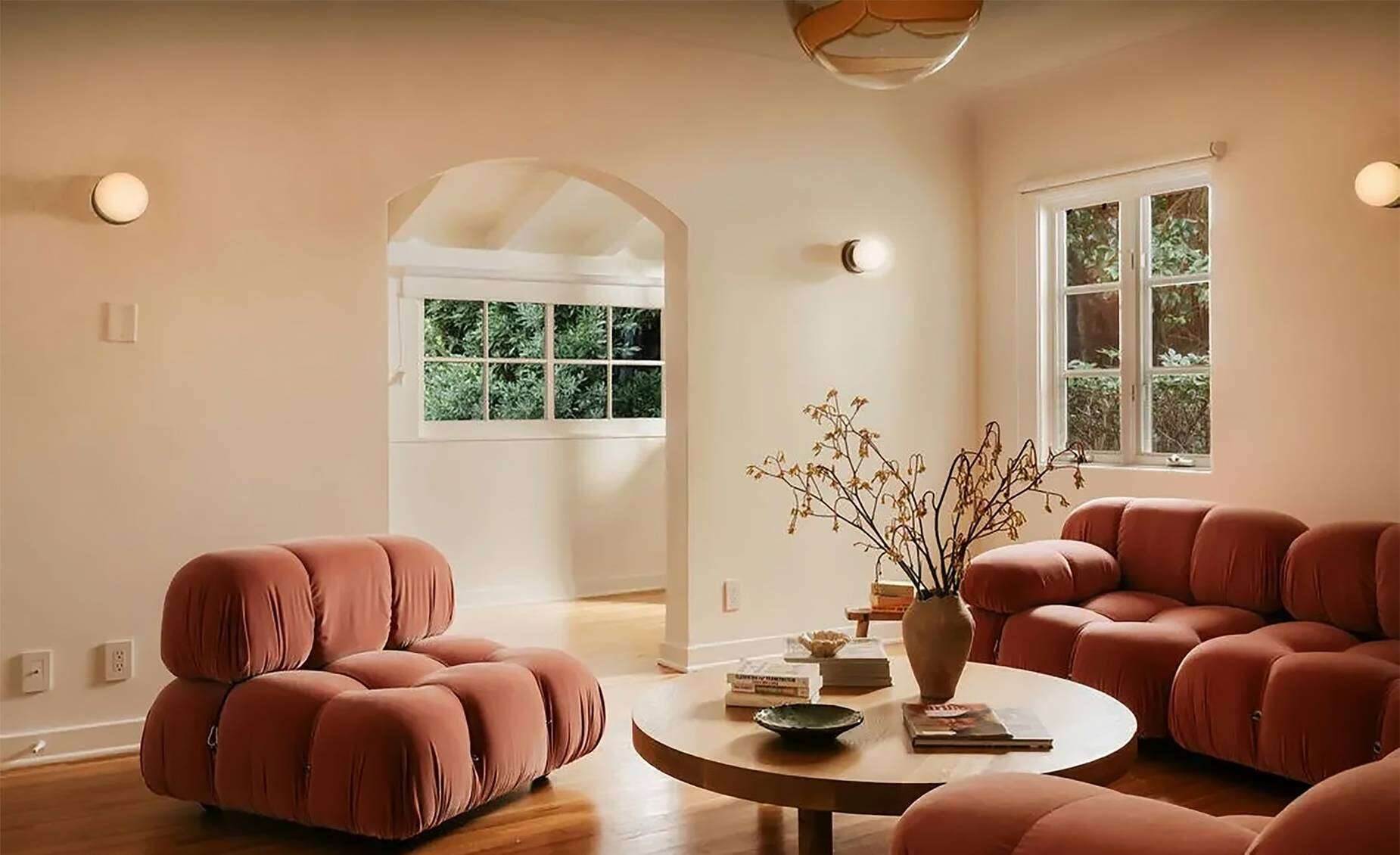 The 1928 Los Feliz compound features period details including stained-glass windows and terracotta floors.