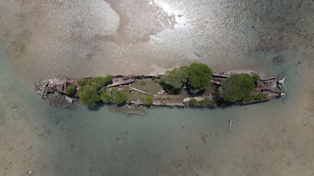 A burned-out vessel was meant to become a breakwater<br>