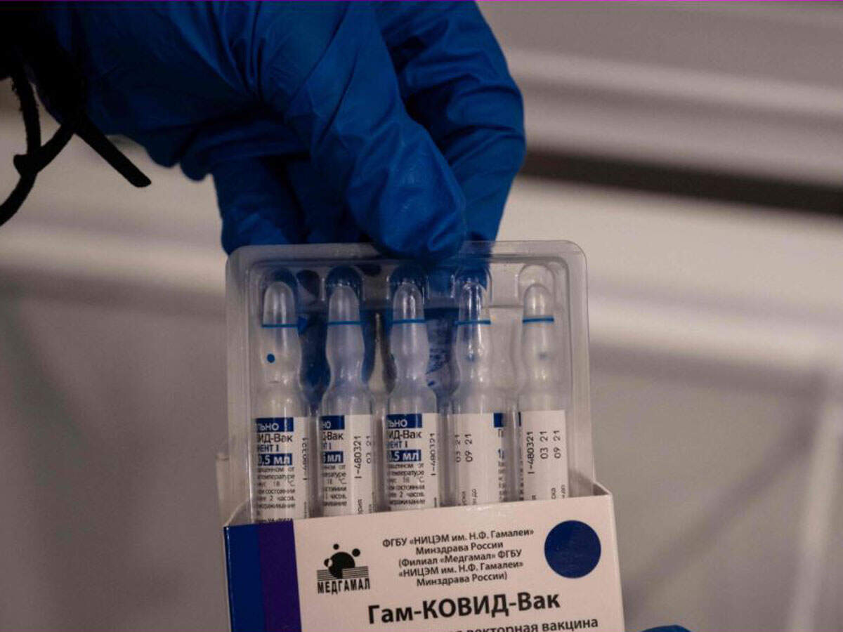 Vials with a dose of the Sputnik V vaccine. (Photo by Yuri CORTEZ / AFP)