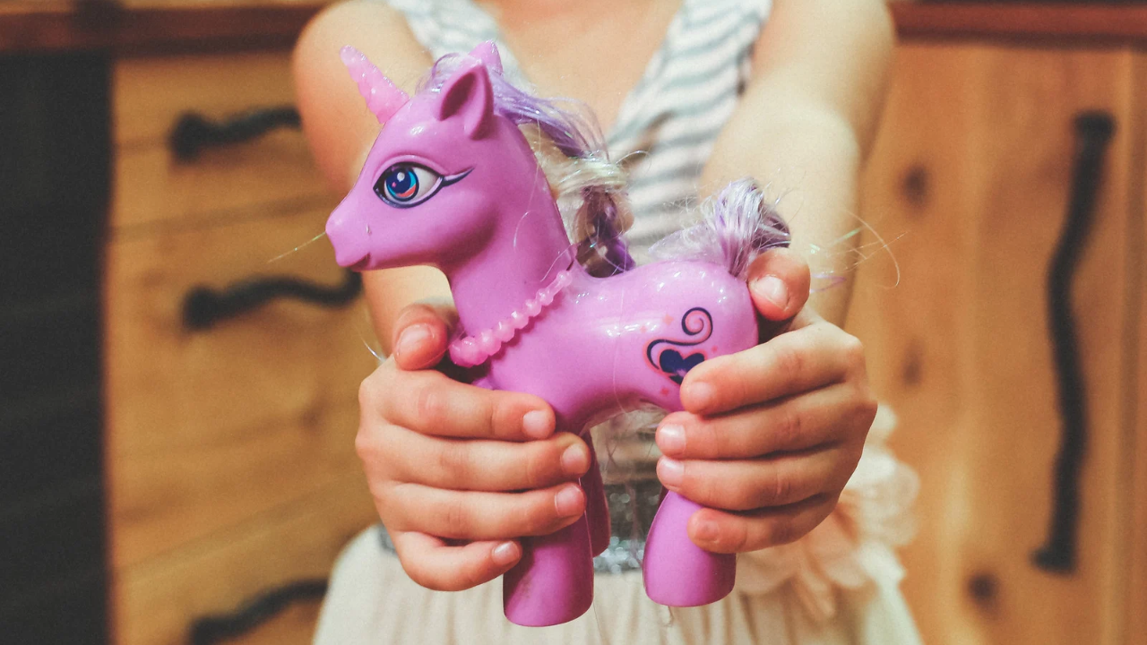Whispering to toys can be one way children practise expressing thoughts and feelings.