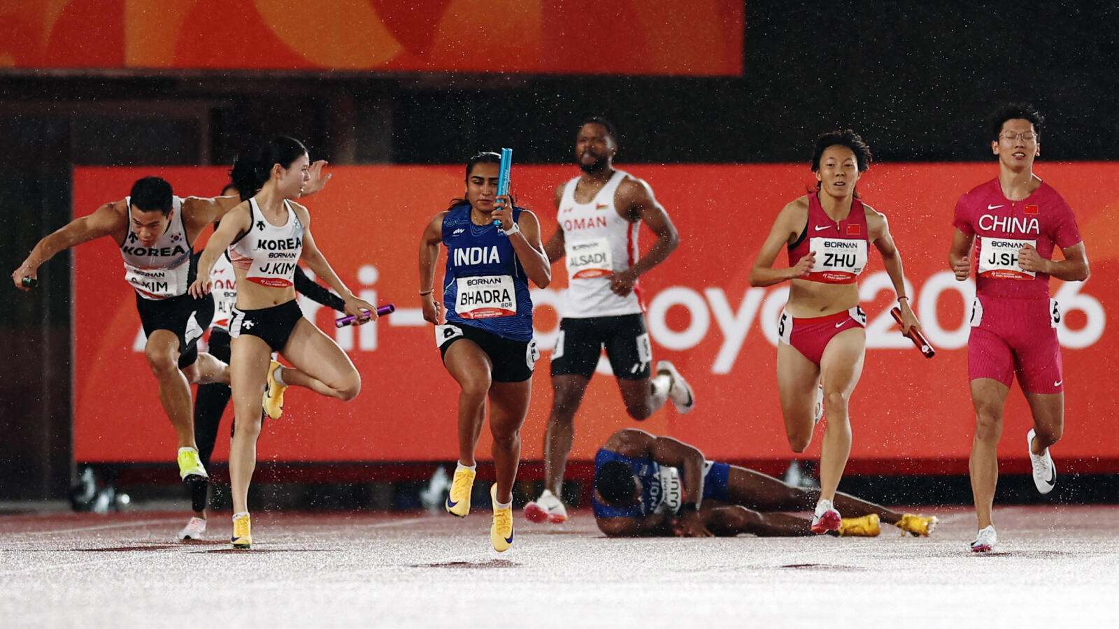 Animesh Kujur fell during the baton exchange before Bhadra took the baton and glanced back for a fleeting second, but with the baton in hand, she focused on the job at hand.