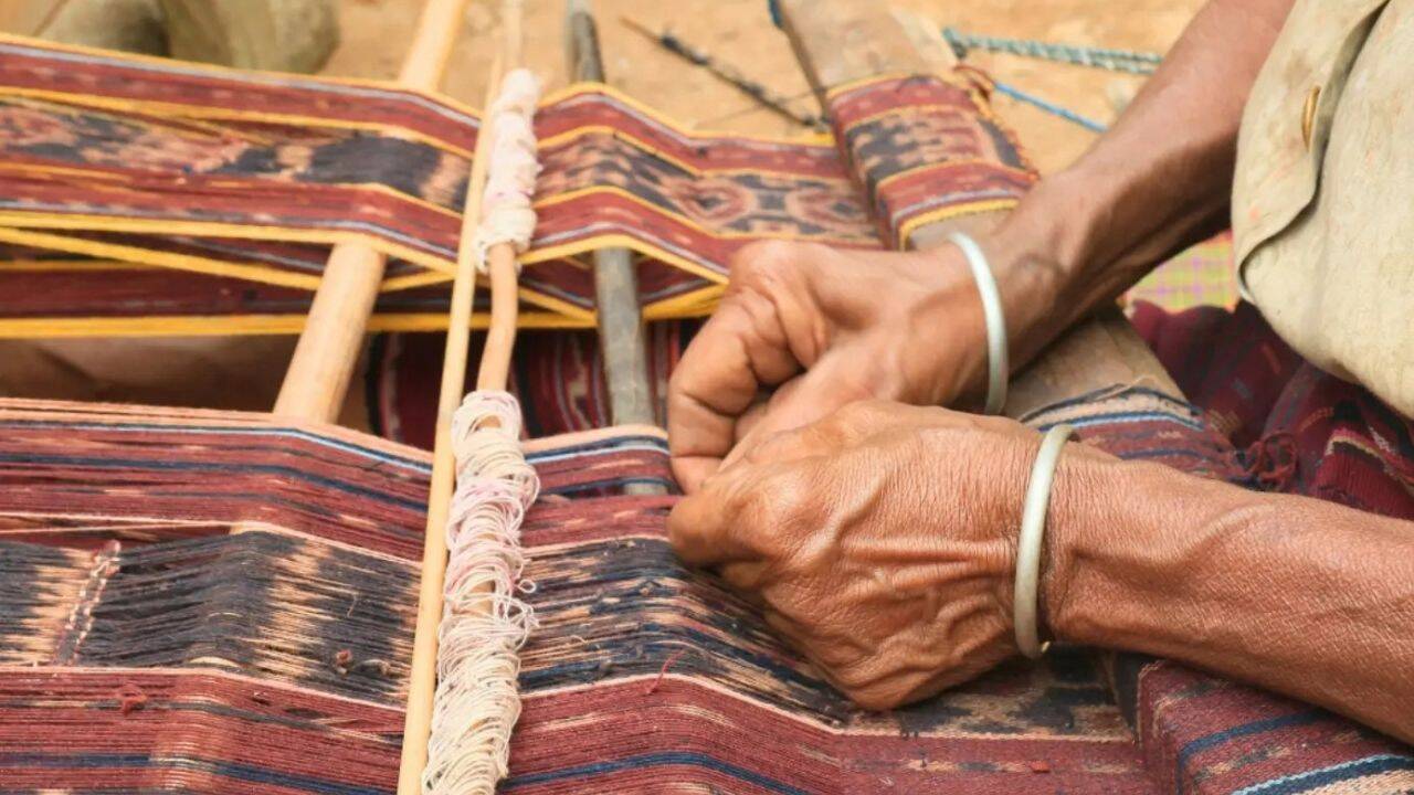 The pattern is planned before the saree reaches the loom. Image credits: The better India<br>