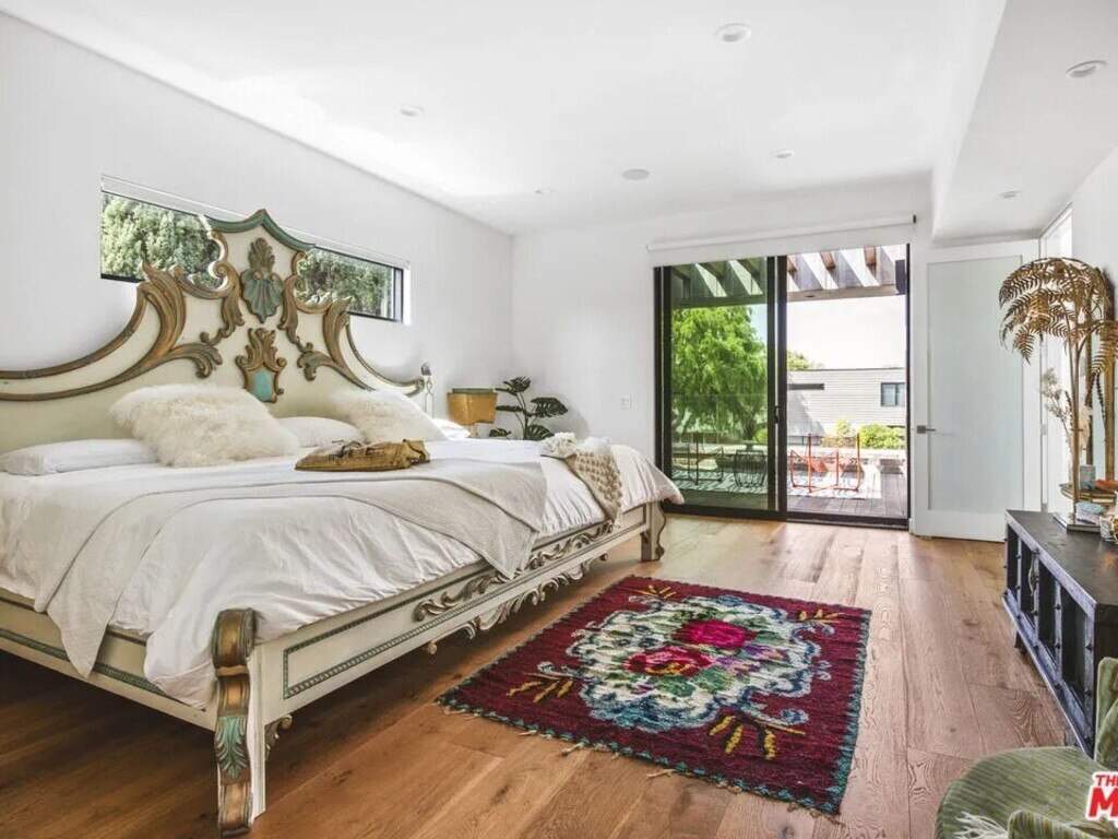 From a music room to a rooftop deck, here's a look inside Kesha's lavish seven-bedroom Los Angeles mansion.