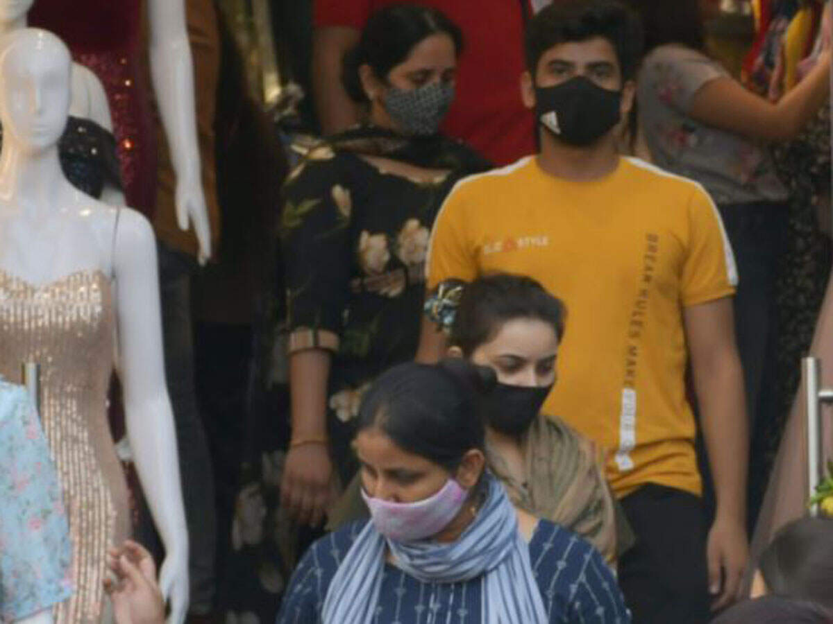 People shopping at Lajpat Nagar Market on Saturday afternoon. TOI PHOTO: TARUN RAWAT