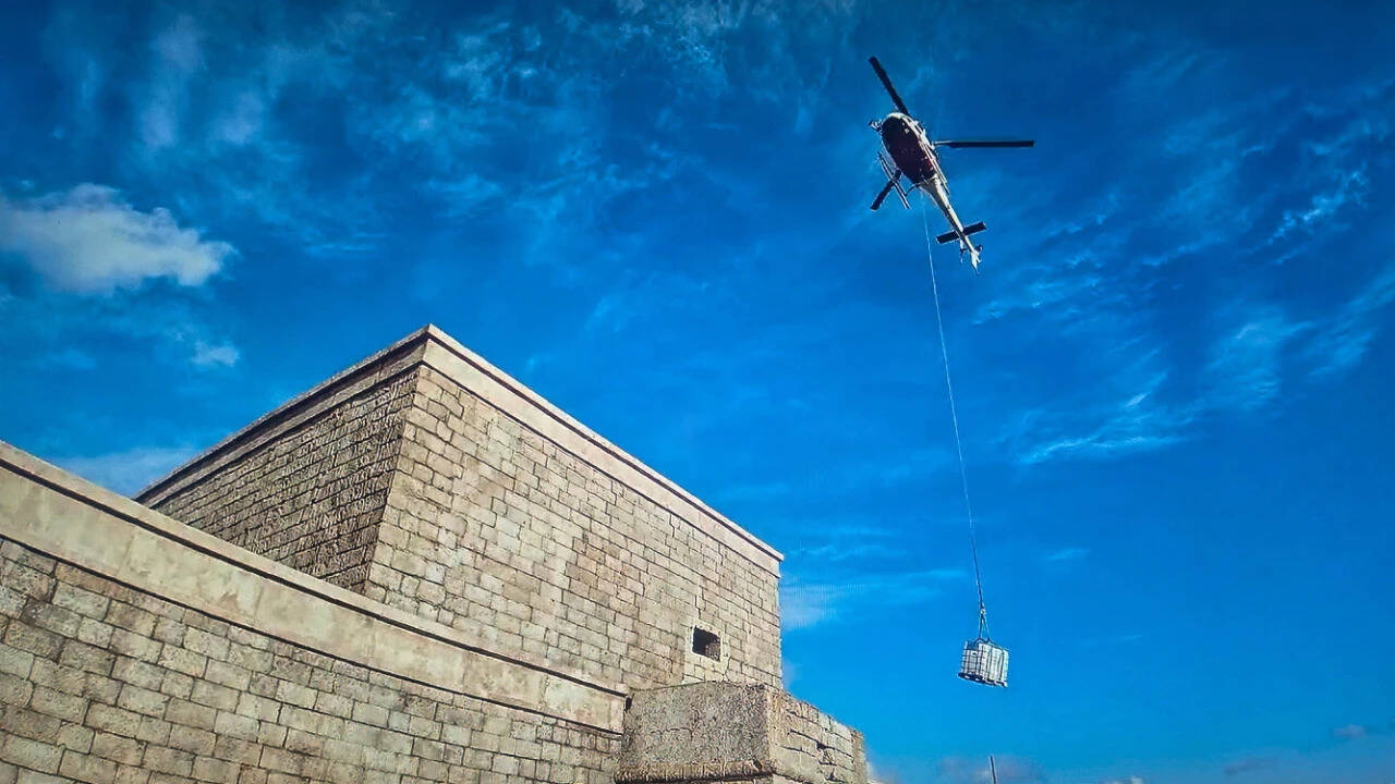 Equipment was transported by helicopter, cable and on foot.