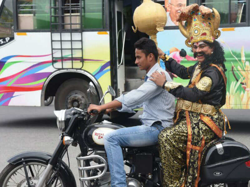 Bangalore news Lord Yamraj on Bangalore roads to teach importance of helmet Bengaluru News