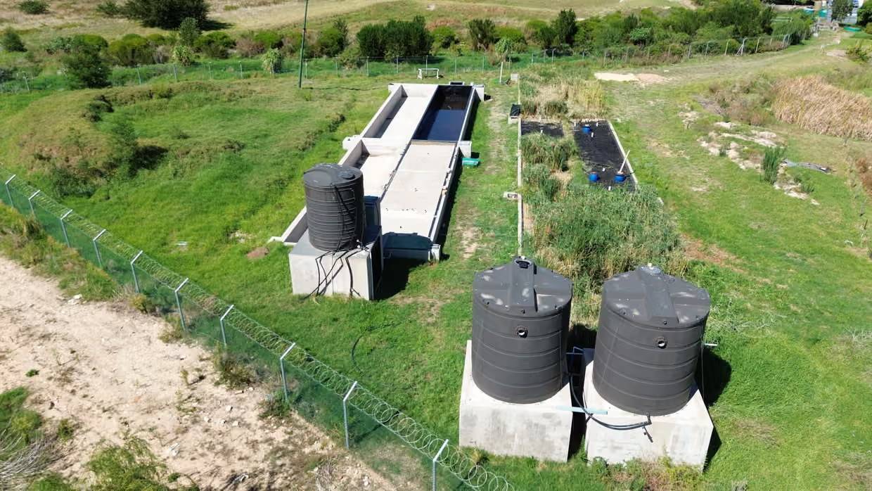 Stones, sand and heat-treated wood form the Water Hub’s natural filtration system