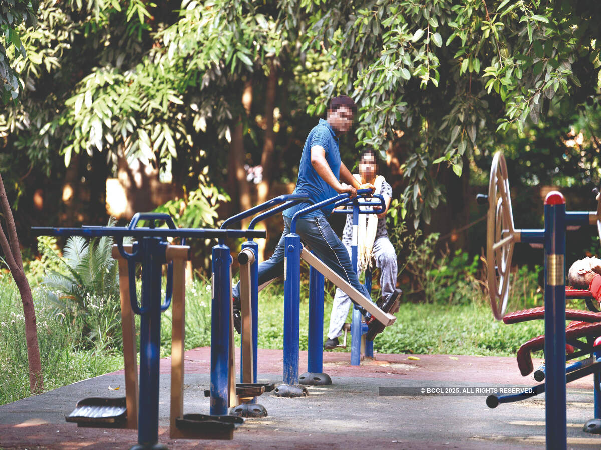 Active users of open gyms in Gurgaon's parks sanitise the machines before and after use