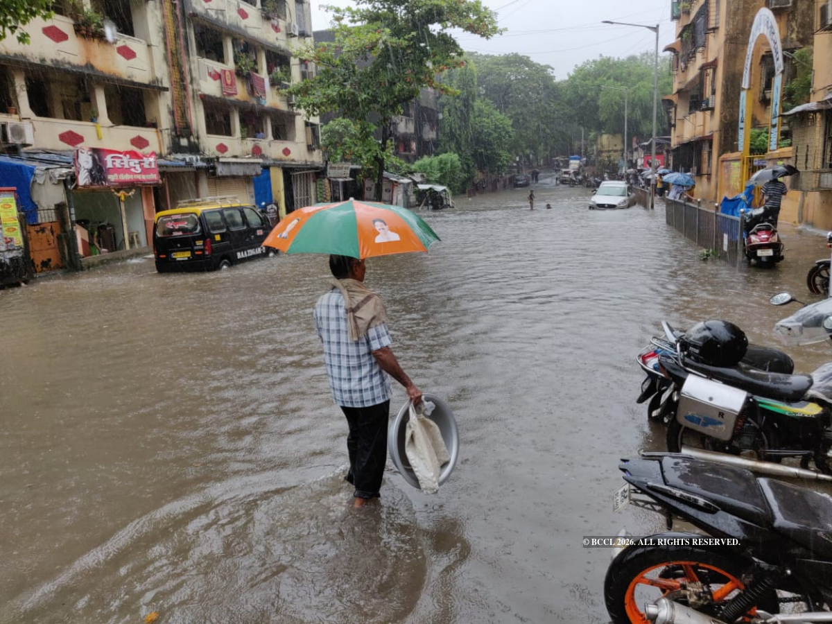 Photos: Heavy rains wreak havoc once again in Mumbai; roads waterlogged ...