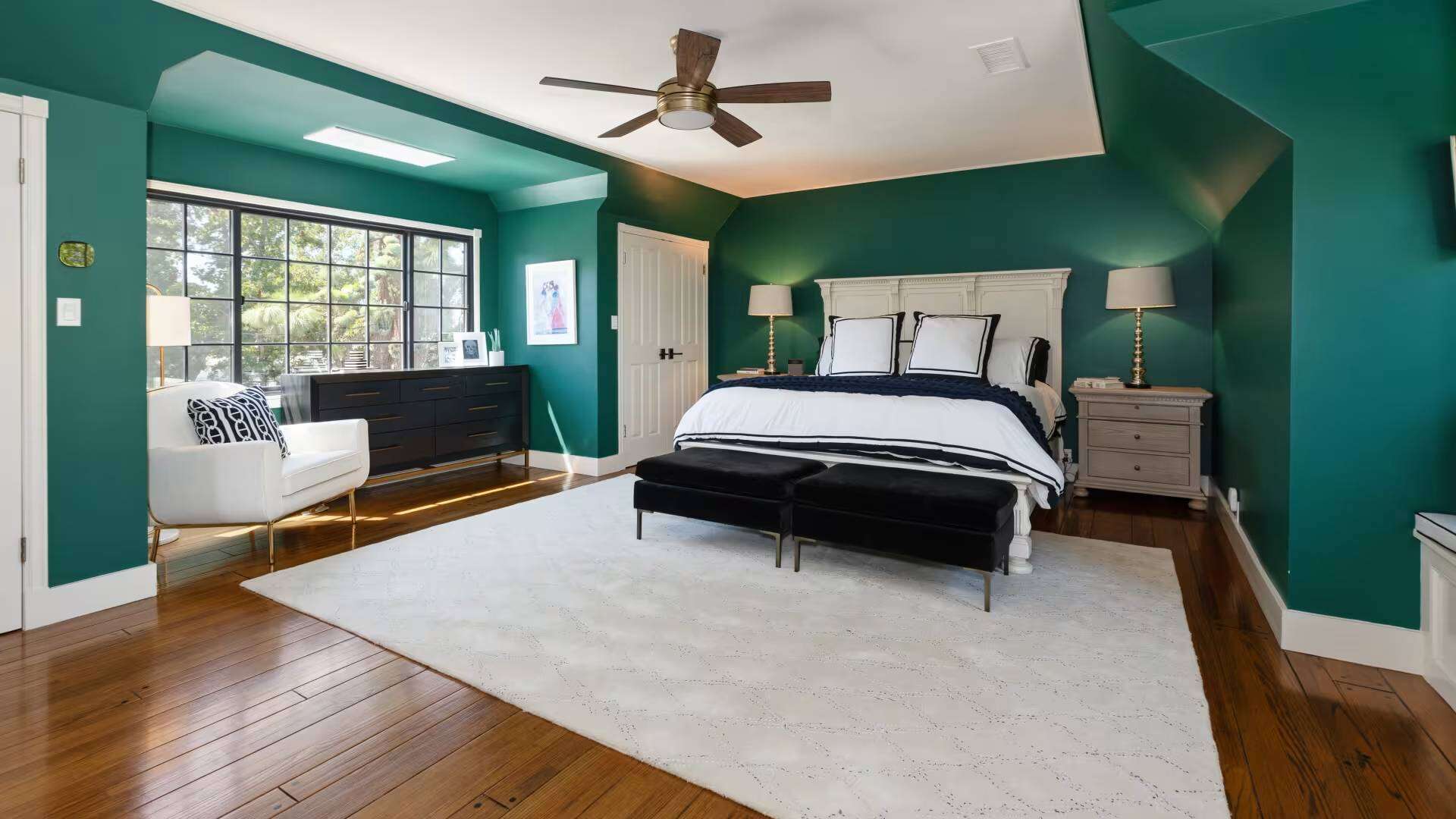 ​The Glendale home retains several features reflecting its 1940s origins, including wood-paneled interiors and three fireplaces.