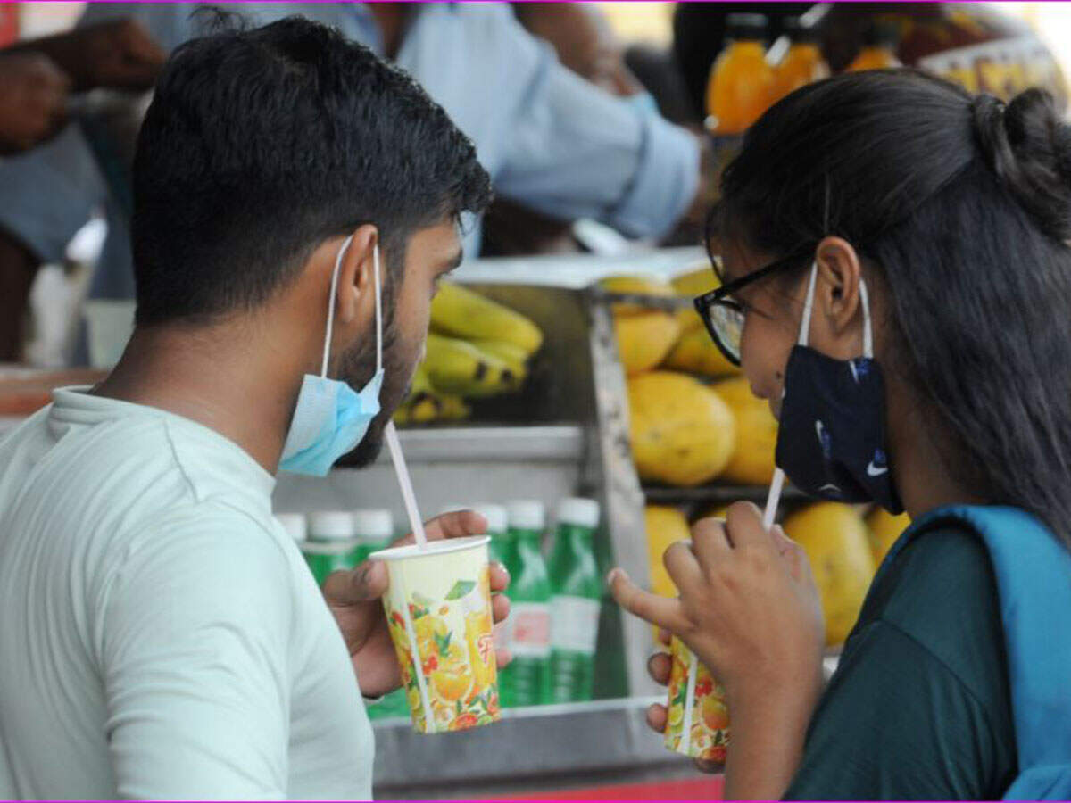 People throng the Sarojini Nagar market during the unlocking process in New Delhi on Sunday. TOI PHOTO: RAJESH MEHTA
