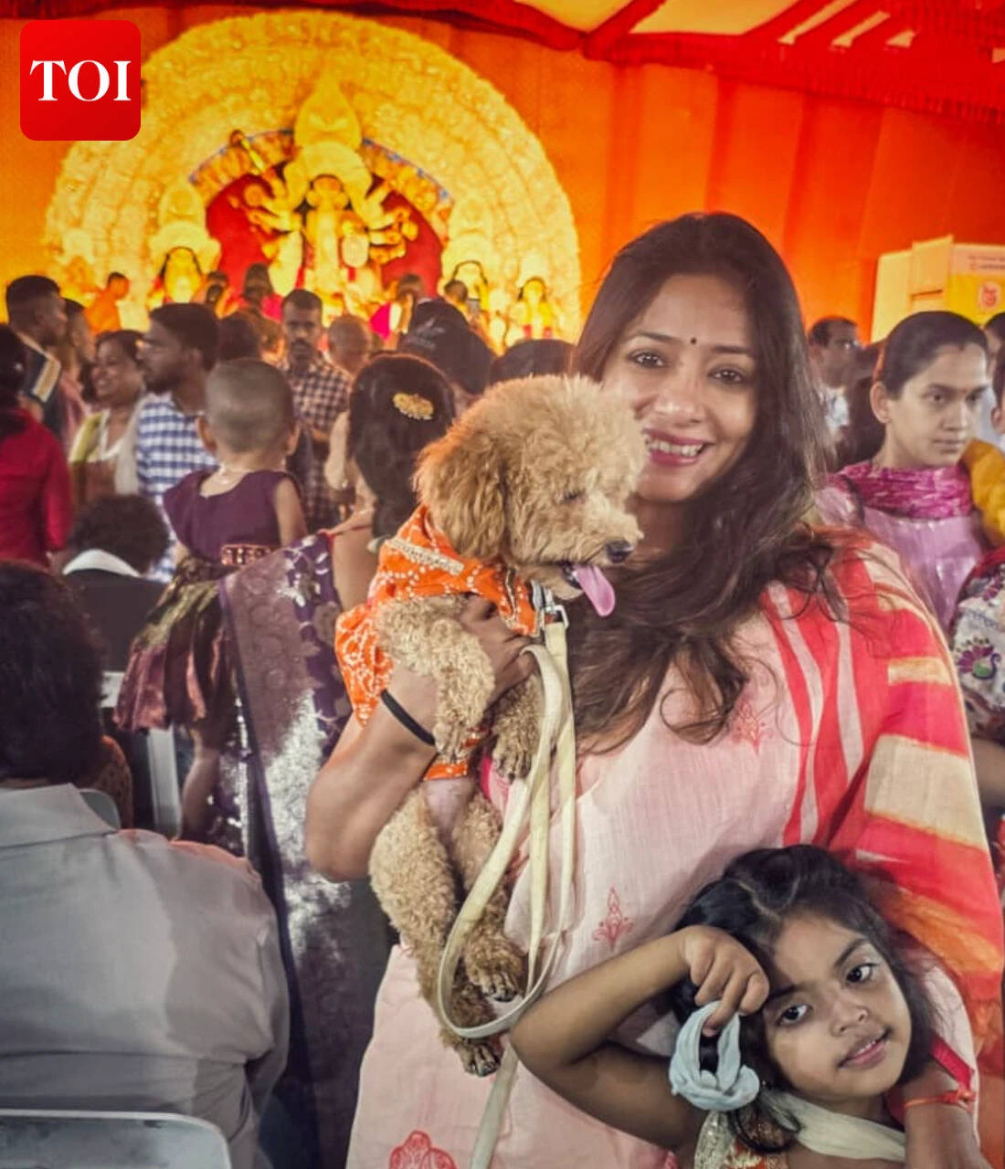 Debarati with her toy poodle, Mocha
