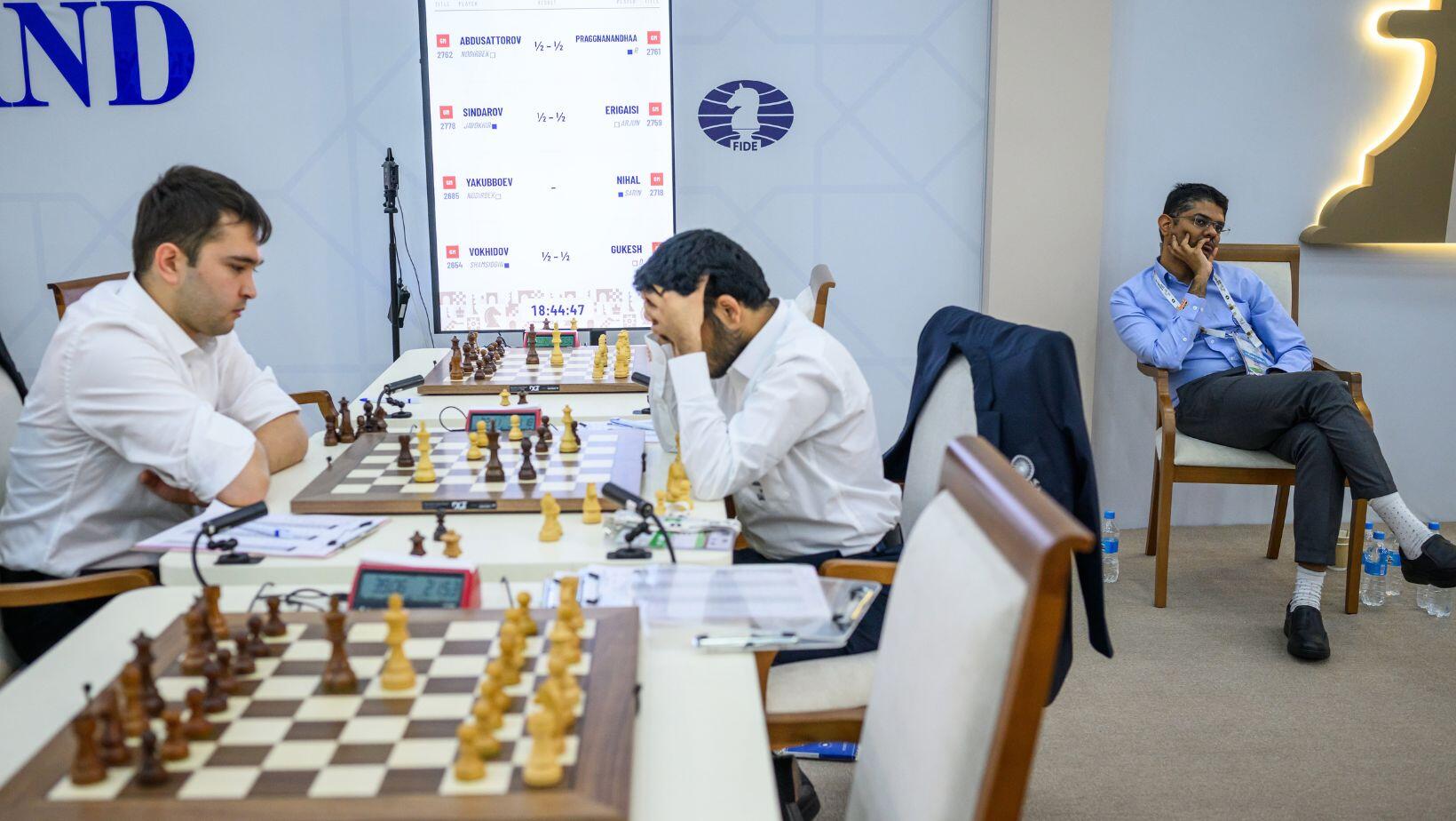 Srinath Narayanan waits for Nihal Sarin's game to end (Photo by Michal Walusza for FIDE)