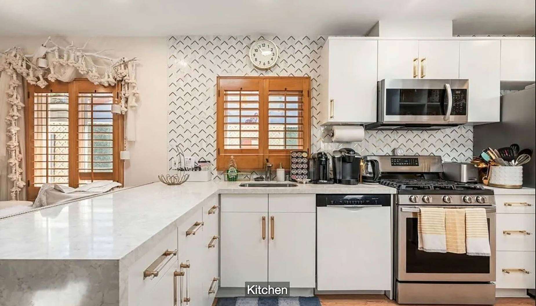 Built in 1923, the former Dolly Parton home features vintage charm, modern interiors and an outdoor entertaining area.