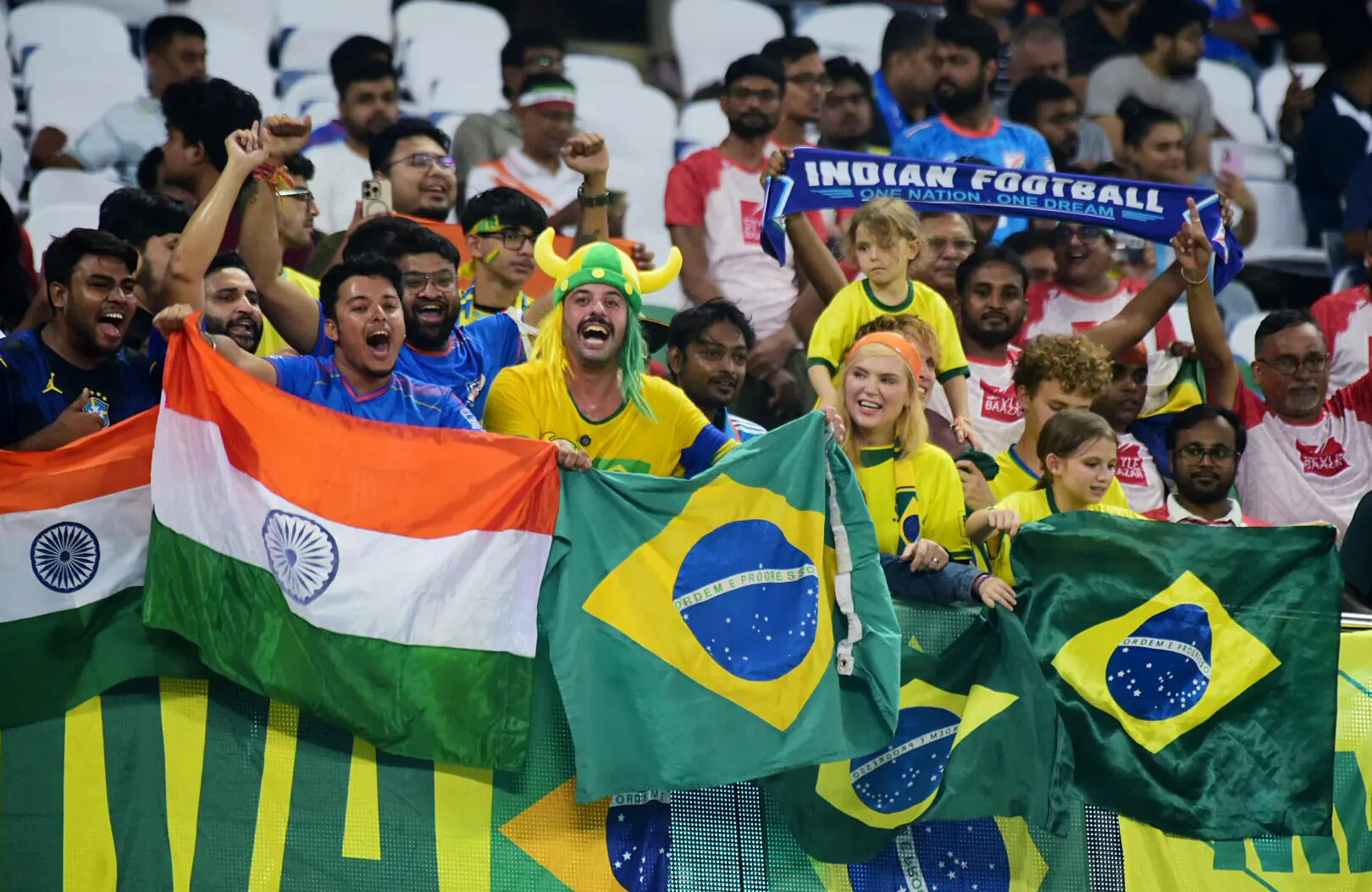 Kolkata, Oct 03 (ANI): Supporters cheer for their teams during the Men's Interna...