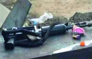 Cops found lying intoxicated, service rifle left unattended; both suspended