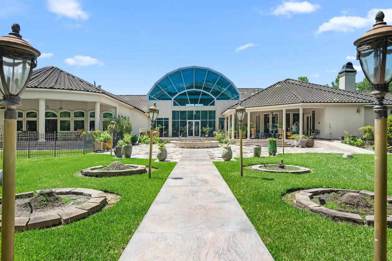 George Foreman’s former home boasts nearly 12,000 square feet of luxury living space.