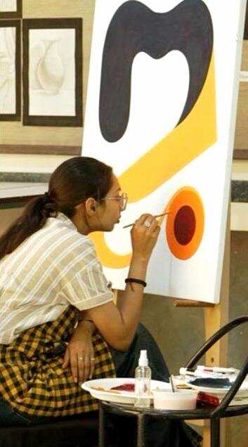 Anandaprobha Sarbajanin preparing for the art exhibition.jpeg