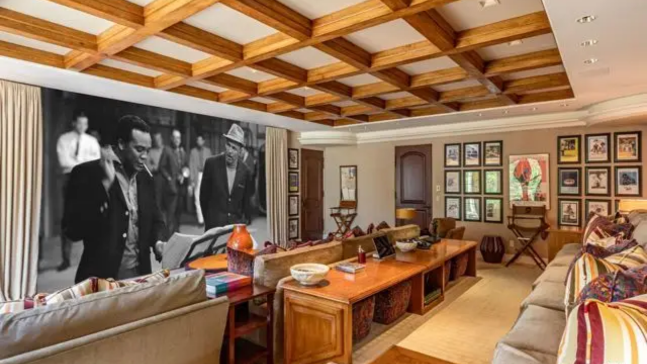The central portion includes a large great room, library, bar, wine-tasting room and an interior garden<br>