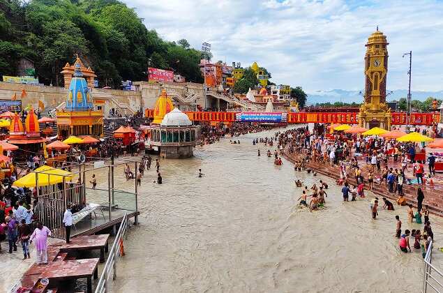 Devotees offer prayer on the occasion of Ganga Dussehra at Har ki Pauri in Haridwar. (ANI photo)