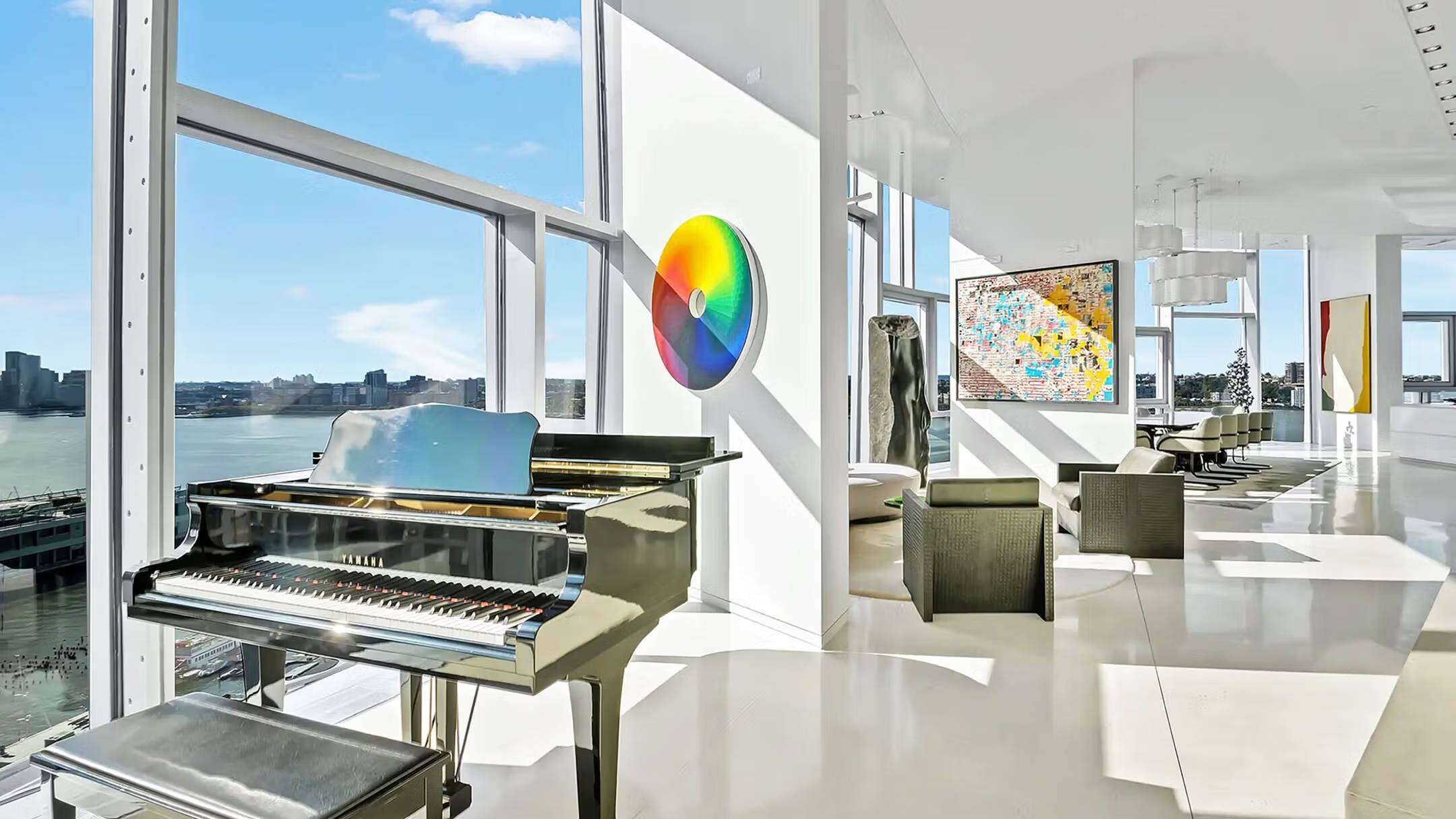 The Richard Meier-designed residence features a double-height living room, Hudson River views, five bedrooms, a spa-style primary suite, sauna and private terrace.