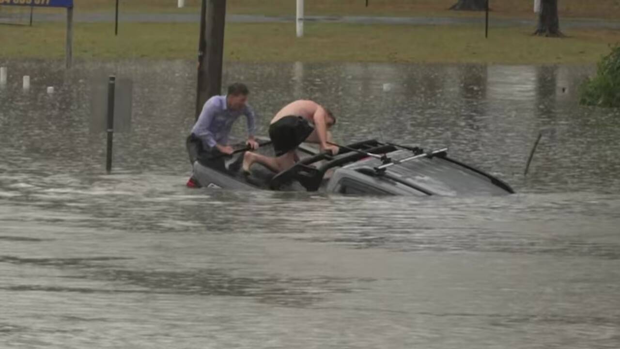 Two men try to rescue