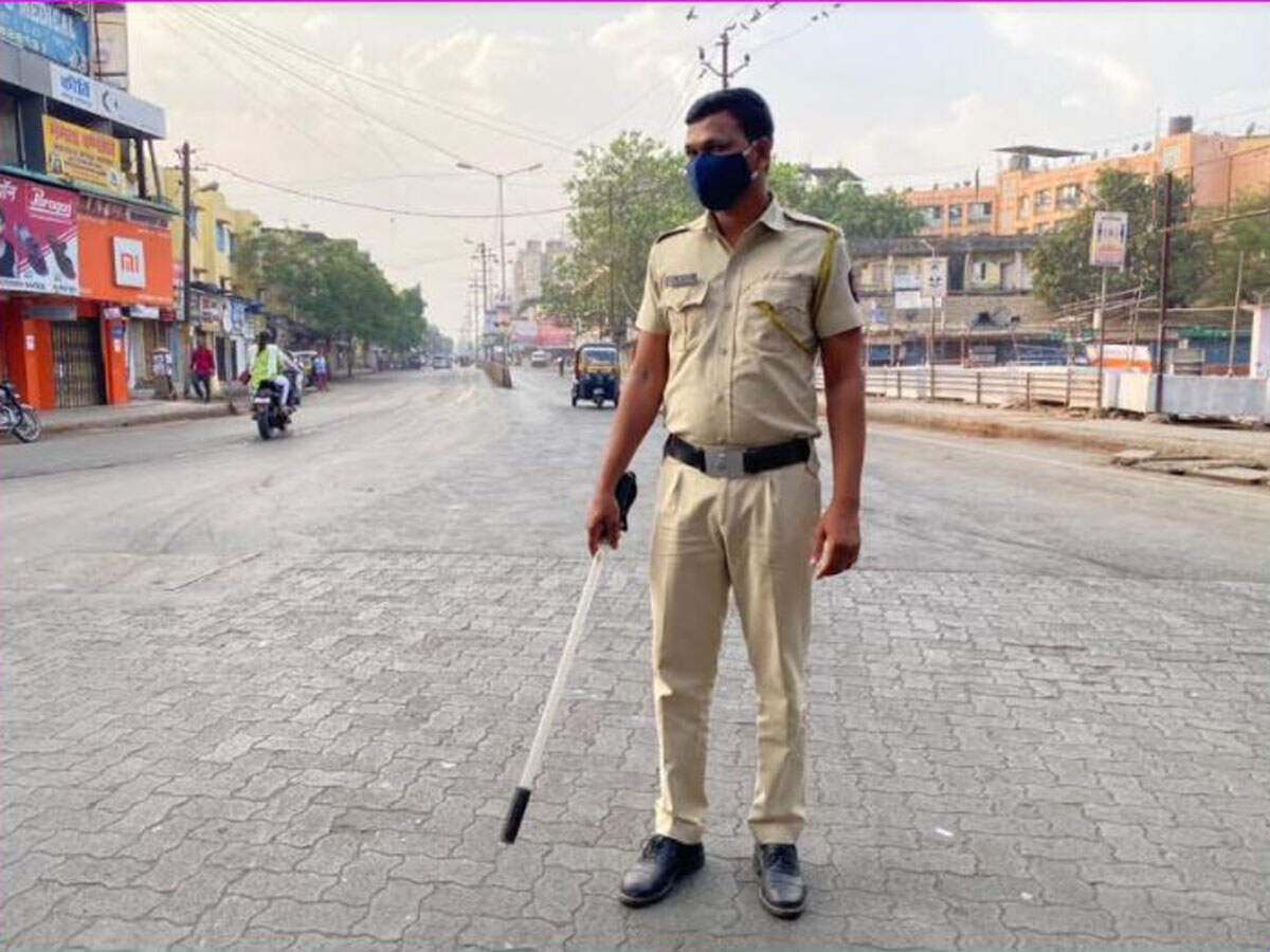 Cars and two-wheelers had to produce documents and proof for staying outdoors. TOI: Hanif Patel