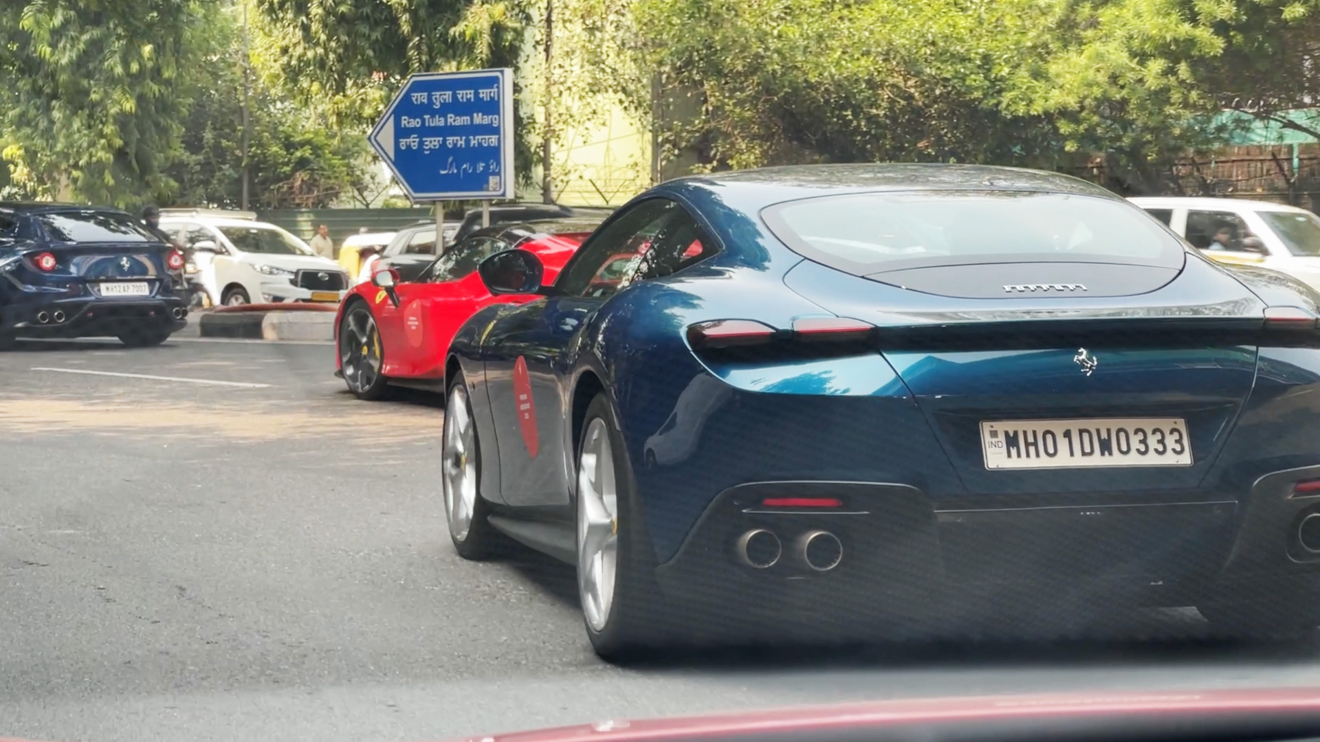 Ferrari FF, SF90 Stradale and Roma cutting through Delhi traffic