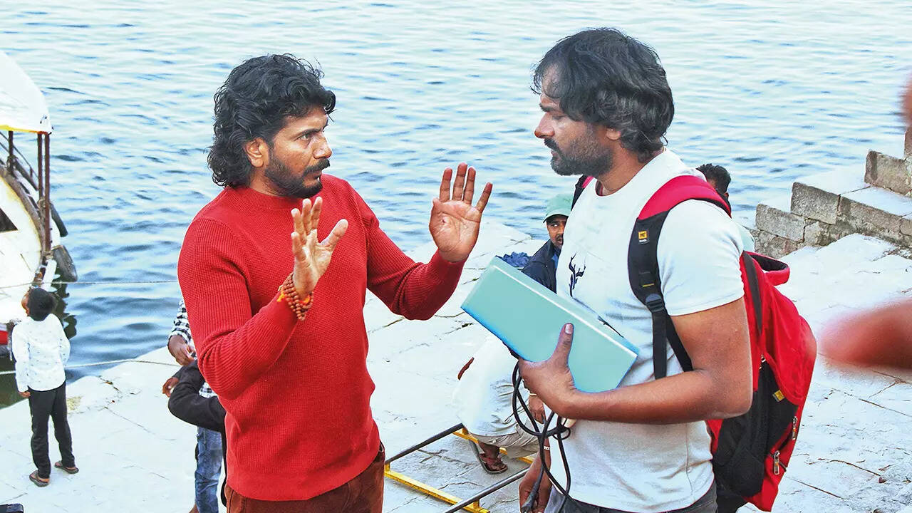 Director Ashok Teja explaining a shot at the ghat