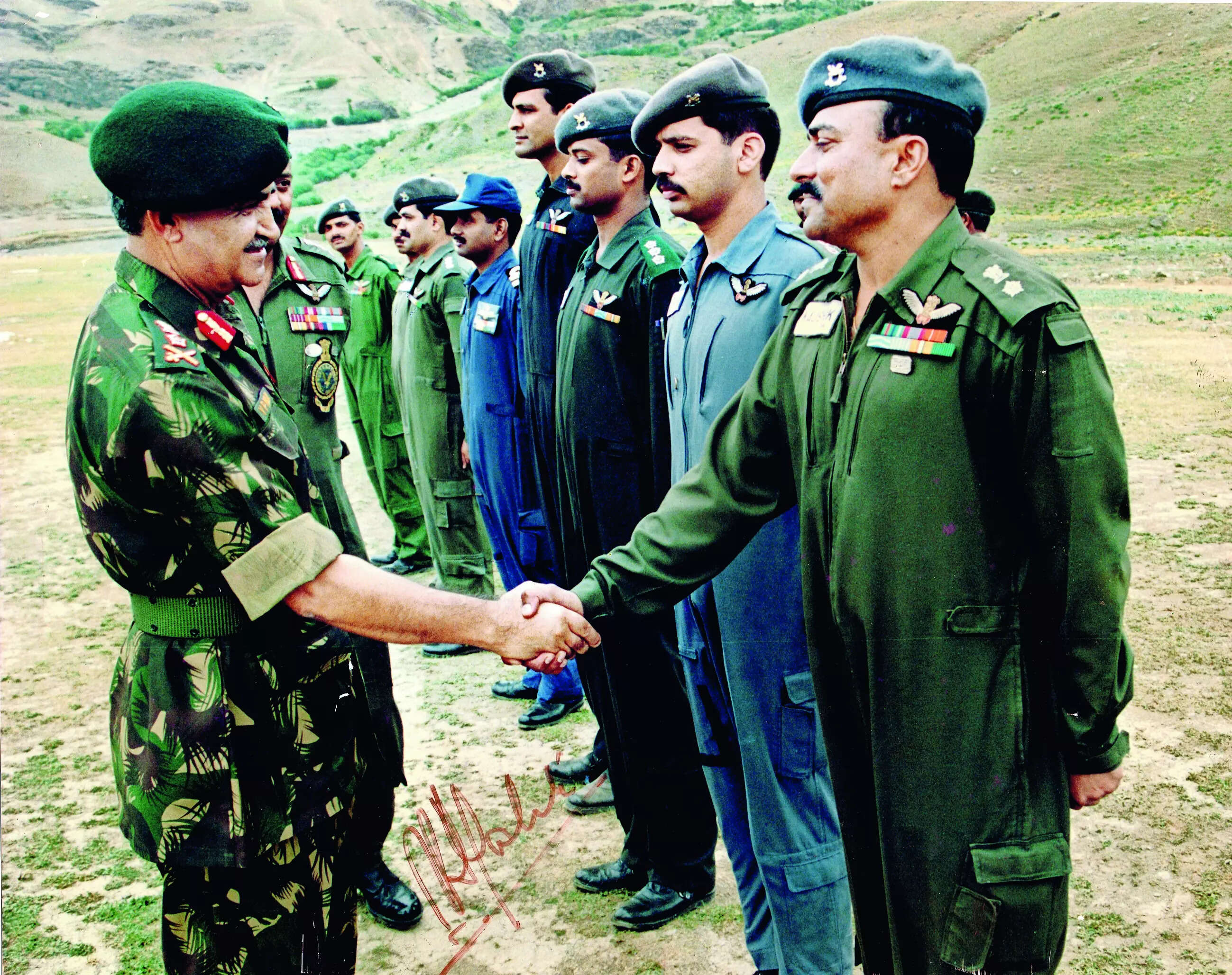 COAS congratulating Army Aviators at Kargil. The picture was taken in July 1999. Col GPS Kaushik and other aviators can be seen.