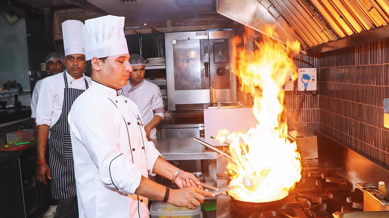Chef Vishnu,  of Mambo preparing fusion cuisine