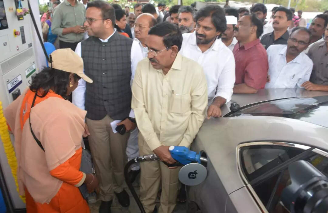 ​AP municipal minister P Narayana filling fuel in a car during the inaguration of filling station set up by Rajahmundry Municipal Corporation in Rajahmundry.