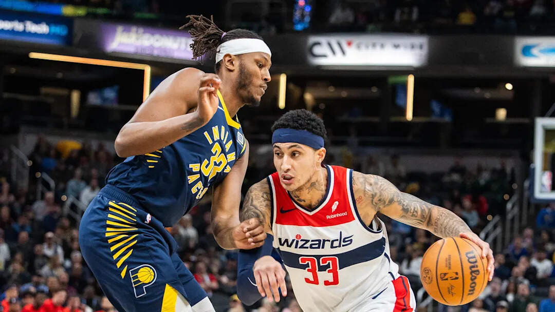 Wizards forward Kyle Kuzma (33) and Indiana Pacers center Myles Turner (33)